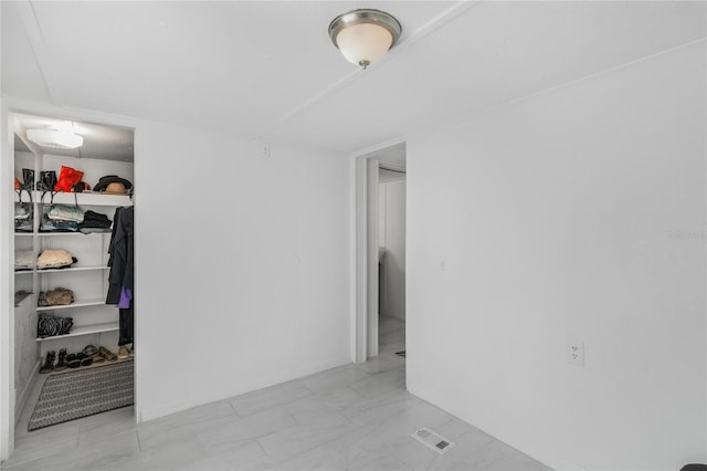 8356 W Tawny Rose, Crystal River, FL 34429 - spare room featuring marble look tiles