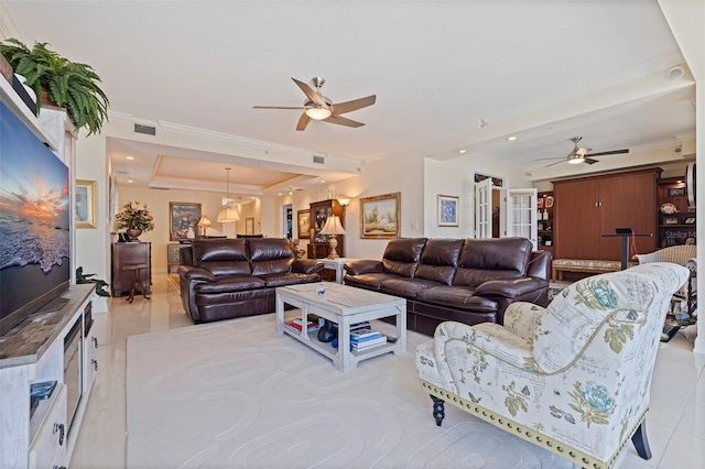 1 Beach Dr SE Unit 2011, Saint Petersburg, FL 33701 - living room with a ceiling fan, light tile patterned floors, crown molding, and a raised ceiling