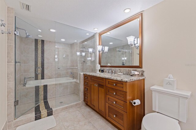 1 Beach Dr SE Unit 2011, Saint Petersburg, FL 33701 - full bath with toilet, tiled shower, vanity, tile patterned flooring, and a relaxing tiled tub