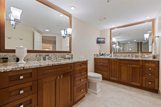 1 Beach Dr SE Unit 2011, Saint Petersburg, FL 33701 - full bath with a stall shower, vanity, tile patterned flooring, recessed lighting, and toilet