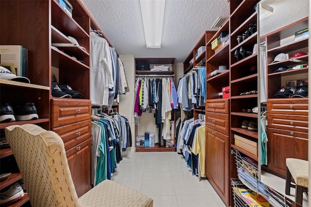 1 Beach Dr SE Unit 2011, Saint Petersburg, FL 33701 - walk in closet with light tile patterned flooring