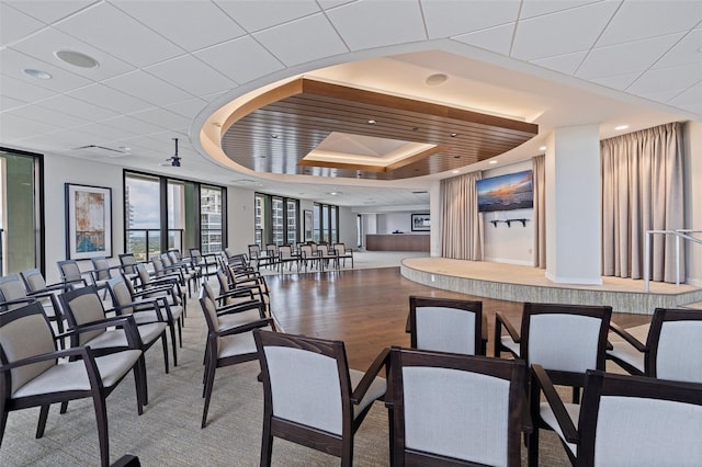 1 Beach Dr SE Unit 2011, Saint Petersburg, FL 33701 - dining space with a tray ceiling, expansive windows, wood finished floors, and recessed lighting
