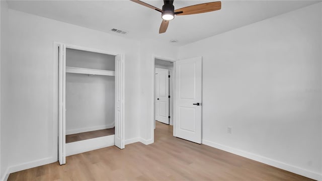 603 Amana Ave, Brandon, FL 33510 - unfurnished bedroom featuring light wood-style floors, baseboards, a closet, and a ceiling fan