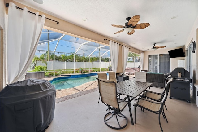 2814 Duncan Tree Cir, Valrico, FL 33594 - view of patio / terrace with a ceiling fan, glass enclosure, and grilling area