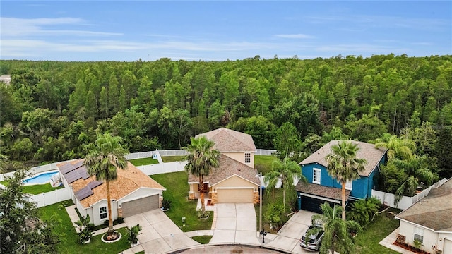 3305 Hoylake Ct, Land O Lakes, FL 34638 - aerial perspective of suburban area with a heavily wooded area