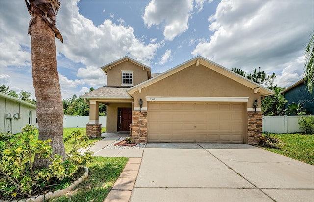 3305 Hoylake Ct, Land O Lakes, FL 34638 - view of front of property with stucco siding, stone siding, concrete driveway, and an attached garage
