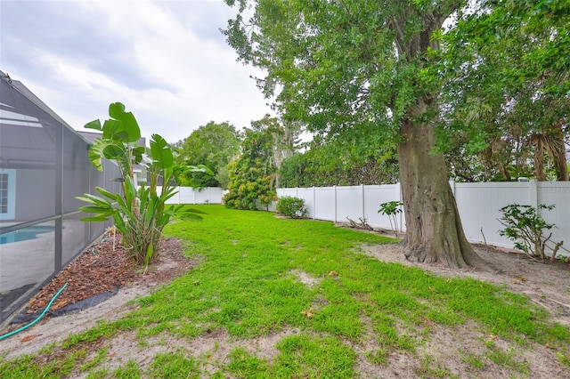 1034 Brighton Way, Lakeland, FL 33813 - view of yard with a lanai