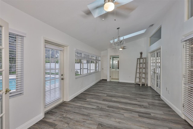 1034 Brighton Way, Lakeland, FL 33813 - unfurnished dining area featuring ceiling fan, healthy amount of natural light, baseboards, and vaulted ceiling