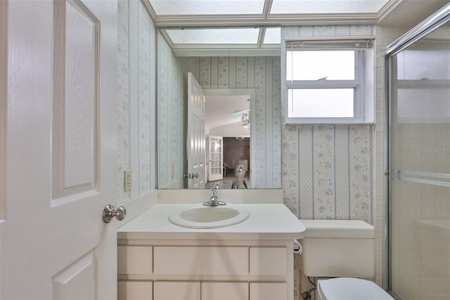 1034 Brighton Way, Lakeland, FL 33813 - full bath featuring wallpapered walls, vanity, toilet, and a tile shower