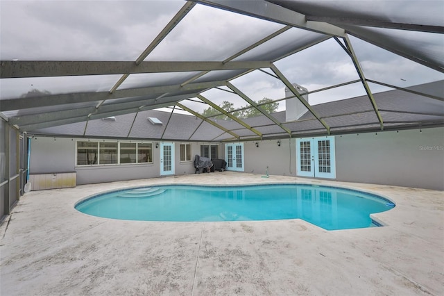 1034 Brighton Way, Lakeland, FL 33813 - outdoor pool with french doors, a patio, and a lanai