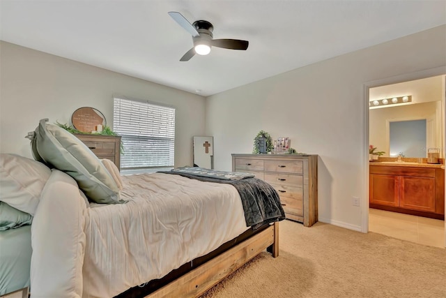 3320 Pleasant Willow Ct, Brandon, FL 33511 - bedroom featuring light carpet, ensuite bathroom, ceiling fan, a sink, and baseboards