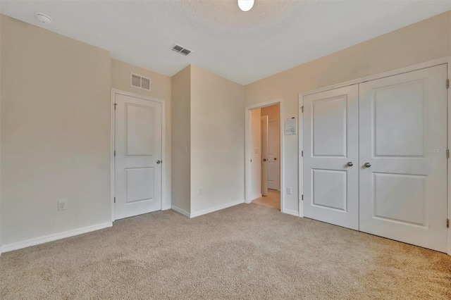 3320 Pleasant Willow Ct, Brandon, FL 33511 - unfurnished bedroom with carpet flooring, baseboards, and a closet