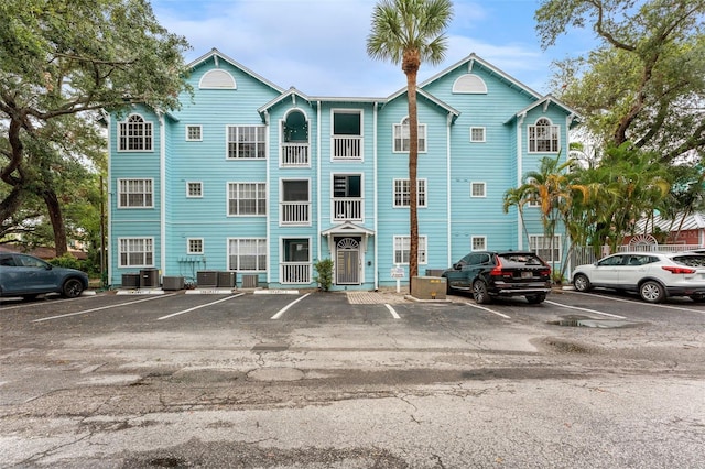 3002 W Cleveland St Unit D4, Tampa, FL 33609 - view of building exterior featuring uncovered parking and cooling unit