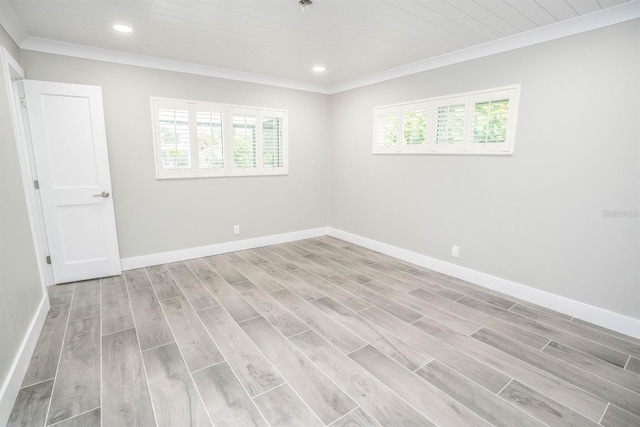913 Spindle Palm Way, Apollo Beach, FL 33572 - spare room with plenty of natural light, recessed lighting, ornamental molding, baseboards, and light wood finished floors