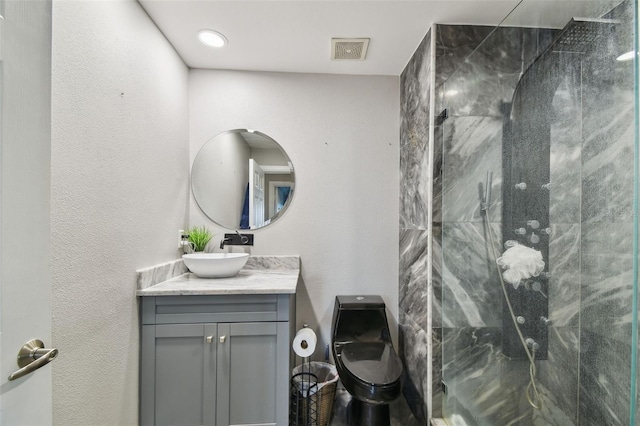 1108 N Franklin St Unit 502, Tampa, FL 33602 - bathroom with vanity, a marble finish shower, and toilet