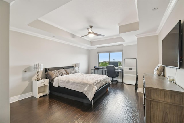 1108 N Franklin St Unit 502, Tampa, FL 33602 - bedroom featuring a tray ceiling, dark wood-style flooring, crown molding, baseboards, and an office area