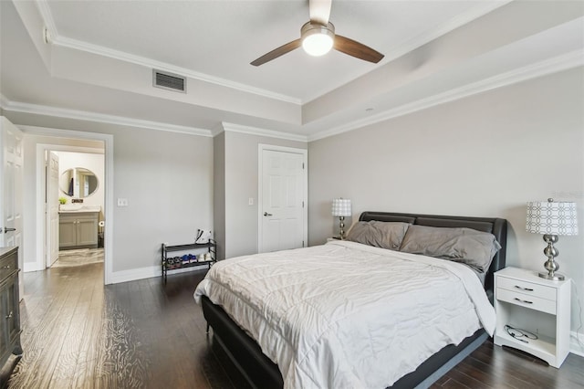 1108 N Franklin St Unit 502, Tampa, FL 33602 - bedroom with dark wood-type flooring, a tray ceiling, baseboards, crown molding, and ceiling fan