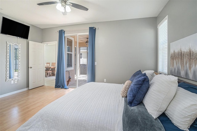 1135 Millbrook Cir, Bradenton, FL 34212 - bedroom with access to exterior, light wood-type flooring, and a ceiling fan
