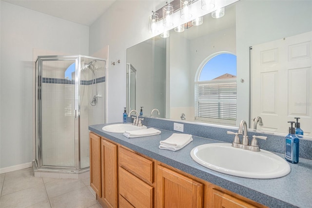 1135 Millbrook Cir, Bradenton, FL 34212 - bathroom featuring a shower stall, tile patterned flooring, and double vanity