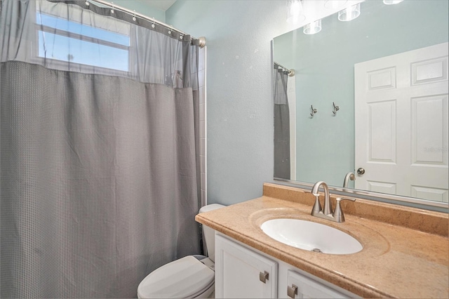 1135 Millbrook Cir, Bradenton, FL 34212 - bathroom with vanity, a shower with shower curtain, and a textured wall