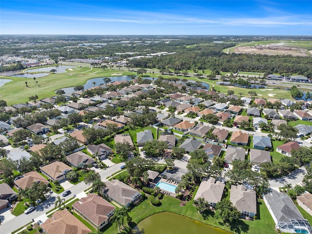 1135 Millbrook Cir, Bradenton, FL 34212 - aerial overview of property's location with a local golf course, a large body of water, and nearby suburban area