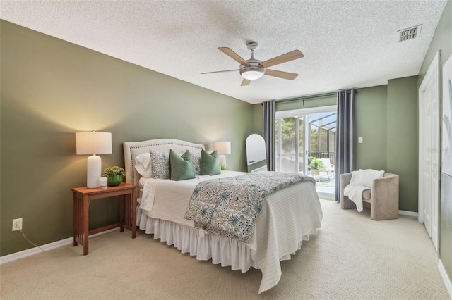 18914 Geraci Rd, Lutz, FL 33548 - bedroom with access to outside, light carpet, ceiling fan, and a textured ceiling