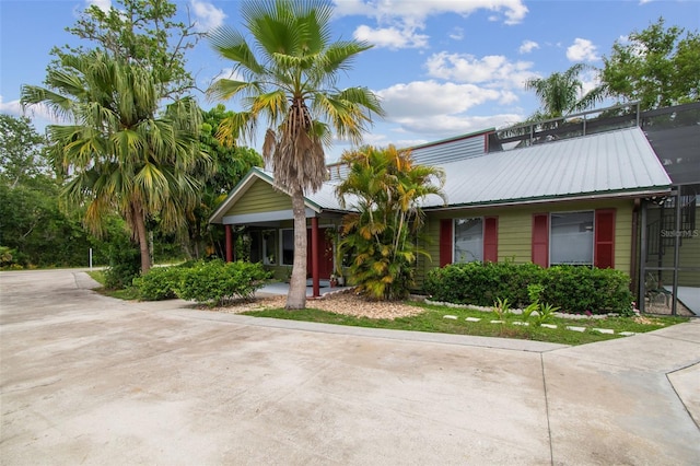 18914 Geraci Rd, Lutz, FL 33548 - view of front facade with a metal roof