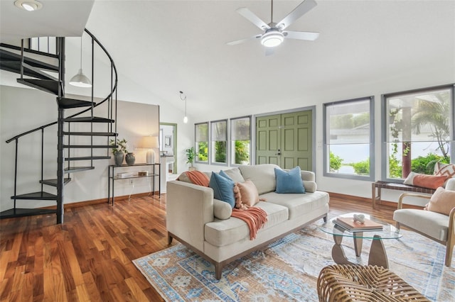 18914 Geraci Rd, Lutz, FL 33548 - living area with plenty of natural light, stairway, high vaulted ceiling, a ceiling fan, and wood finished floors