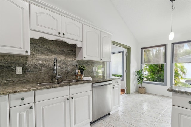 18914 Geraci Rd, Lutz, FL 33548 - kitchen featuring dishwasher, vaulted ceiling, tasteful backsplash, white cabinets, and hanging light fixtures