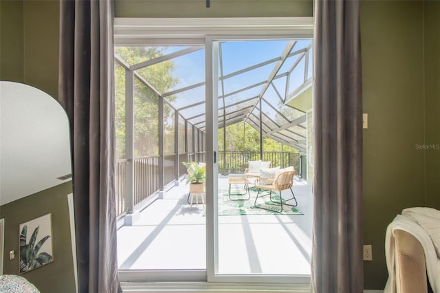18914 Geraci Rd, Lutz, FL 33548 - doorway to outside featuring a sunroom and lofted ceiling