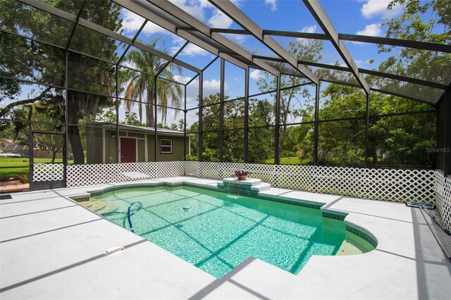 18914 Geraci Rd, Lutz, FL 33548 - view of swimming pool featuring a patio area and glass enclosure