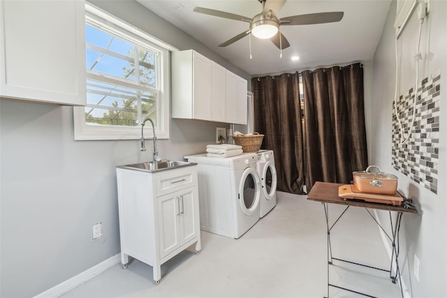 18914 Geraci Rd, Lutz, FL 33548 - laundry area featuring washing machine and dryer, cabinet space, and a ceiling fan