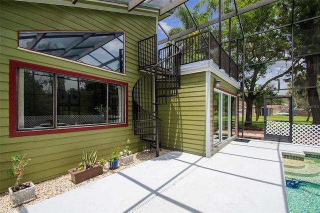 18914 Geraci Rd, Lutz, FL 33548 - view of property exterior featuring a patio area and stairs