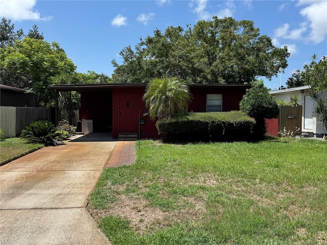 4136 12th Ave N, Saint Petersburg, FL 33713 - view of front facade featuring concrete driveway and a carport