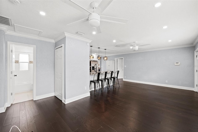 3906 W Rogers Ave, Tampa, FL 33611 - interior space with ceiling fan, dark wood finished floors, crown molding, baseboards, and recessed lighting
