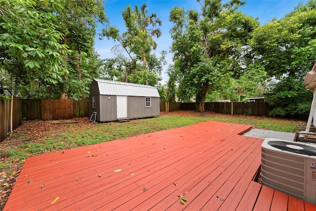 3906 W Rogers Ave, Tampa, FL 33611 - deck with central AC unit and a fenced backyard
