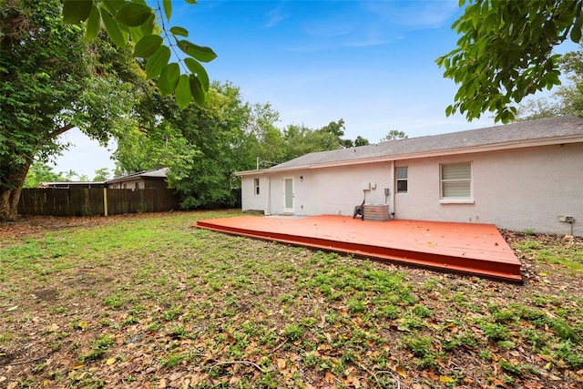 3906 W Rogers Ave, Tampa, FL 33611 - view of yard featuring a deck and central AC