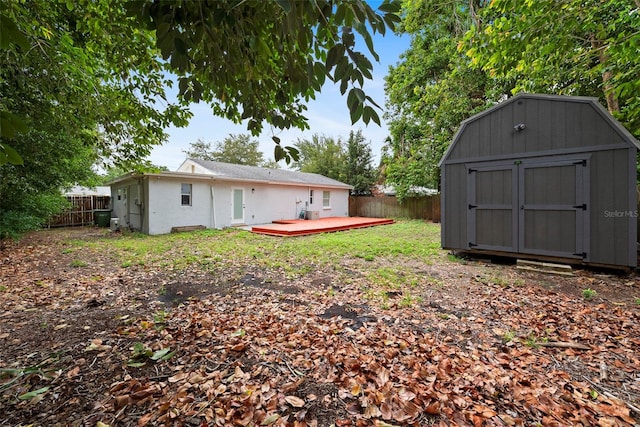 3906 W Rogers Ave, Tampa, FL 33611 - fenced backyard featuring a deck