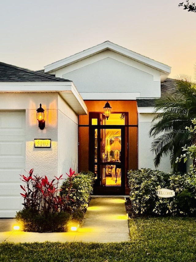 5103 98th Ave E, Parrish, FL 34219 - property entrance with stucco siding