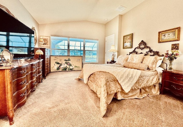 5103 98th Ave E, Parrish, FL 34219 - bedroom with light colored carpet and vaulted ceiling