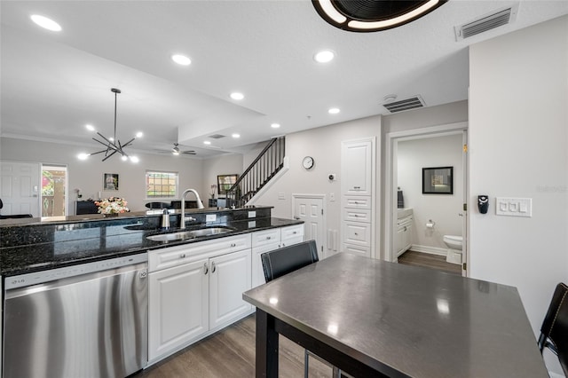 340 1st St N Unit I, Saint Petersburg, FL 33701 - kitchen with dishwasher, a sink, white cabinetry, dark wood finished floors, and recessed lighting