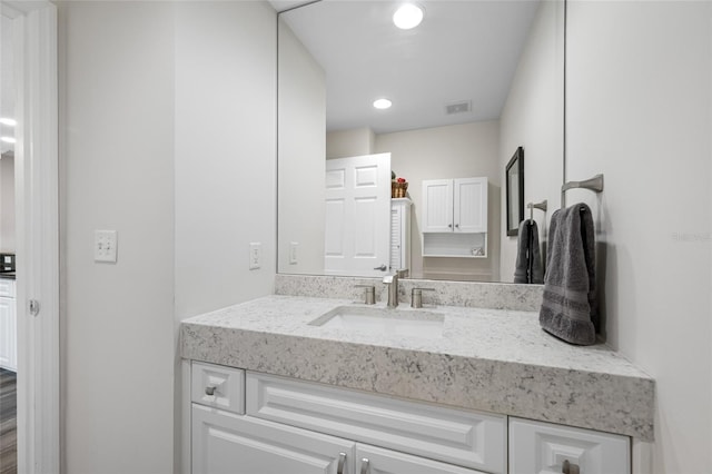 340 1st St N Unit I, Saint Petersburg, FL 33701 - bathroom with vanity and recessed lighting