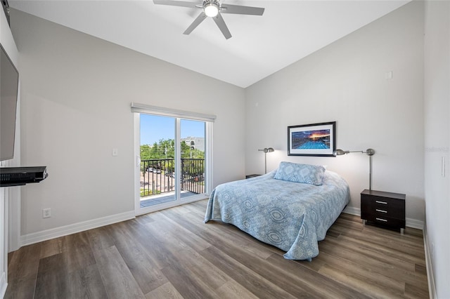 340 1st St N Unit I, Saint Petersburg, FL 33701 - bedroom with access to outside, vaulted ceiling, wood finished floors, baseboards, and ceiling fan