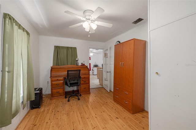1235 Bass Blvd, Dunedin, FL 34698 - office with light wood finished floors, a ceiling fan, and ornamental molding