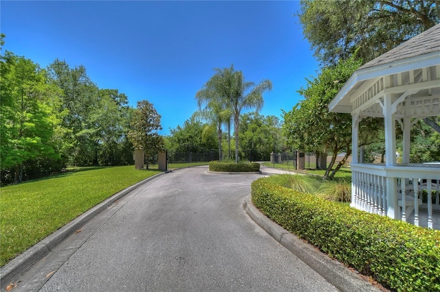 1460 Kensington Woods Dr, Lutz, FL 33549 - view of asphalt street with curbs