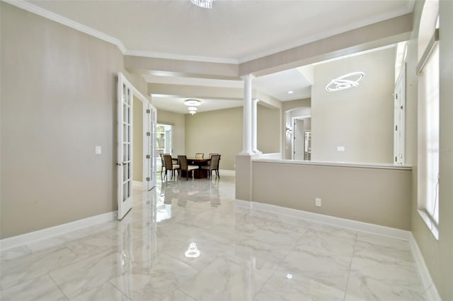 1460 Kensington Woods Dr, Lutz, FL 33549 - unfurnished room featuring ornate columns, marble finish flooring, and crown molding