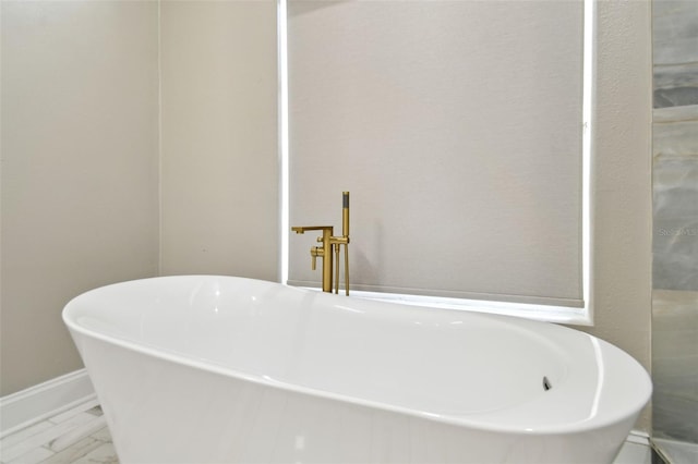 1460 Kensington Woods Dr, Lutz, FL 33549 - full bathroom featuring a freestanding bath and marble finish floors