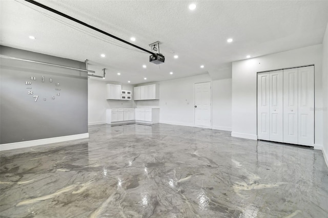 1460 Kensington Woods Dr, Lutz, FL 33549 - garage featuring a garage door opener and recessed lighting