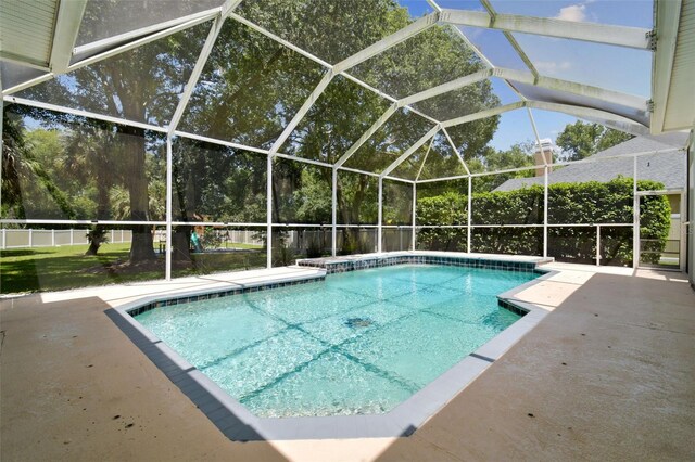 1460 Kensington Woods Dr, Lutz, FL 33549 - view of swimming pool featuring a patio area