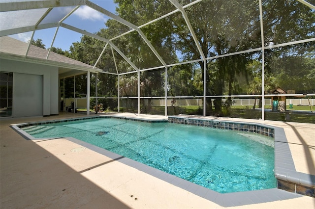 1460 Kensington Woods Dr, Lutz, FL 33549 - swimming pool with a patio and glass enclosure